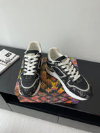Women’s low-top sneakers, black monogram, white laces, padded cream collar