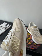 Women's cream lace-up sneakers with side logo panel and raised collar