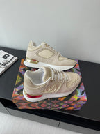 Women's cream lace-up sneakers with LV logo side and red-tinted sole edge