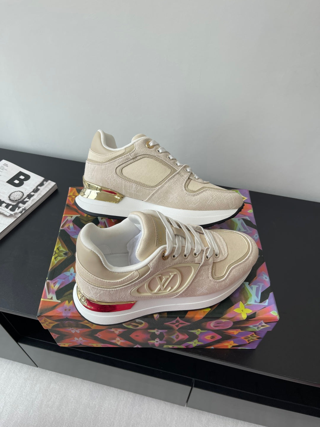 Women's cream lace-up sneakers with LV logo side and red-tinted sole edge