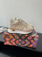 Women's cream lace-up sneakers with gold LV emblem and white rubber sole
