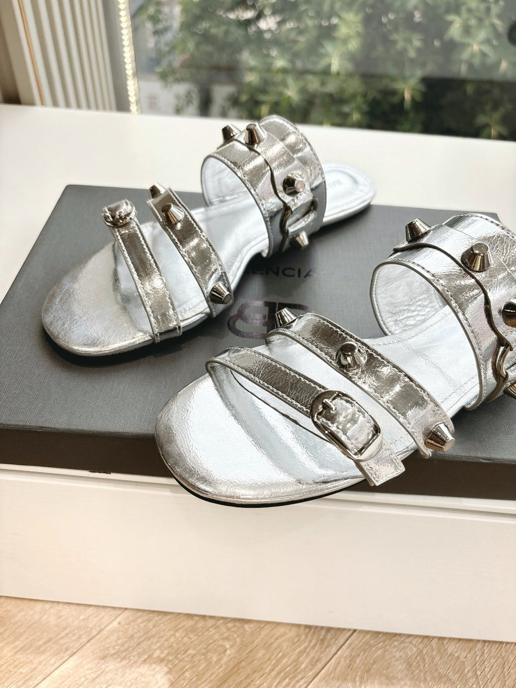 Balenciaga ladies metallic silver sandals with open toe and multi-strap buckle closures