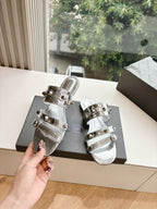 Balenciaga ladies metallic silver sandals with stacked straps and square buckle hardware