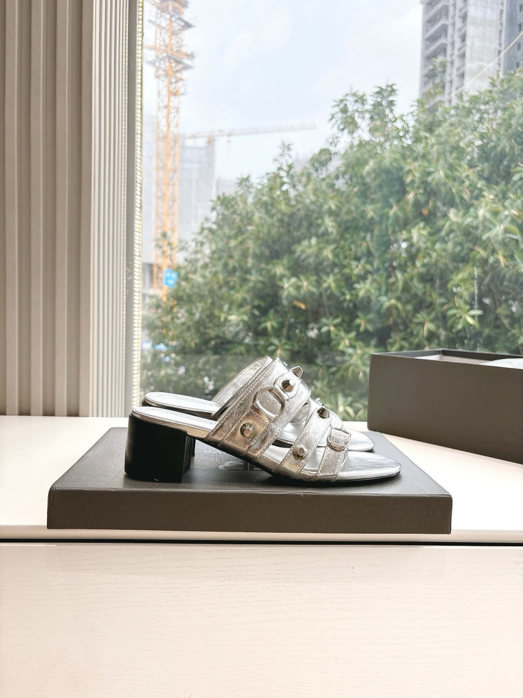 Balenciaga metallic silver heeled sandals with multiple buckles and open slide design