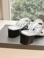 Balenciaga metallic silver sandals with open toe straps and block heel, black underside
