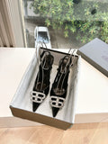 Women's black patent slingback heels with jeweled silver square buckle