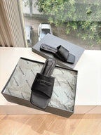 Balenciaga slide sandals in black leather with squared toe and double straps