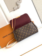 Louis Vuitton crossbody bag with maroon flap, monogram front panel, gold chain strap.