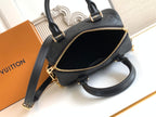 Louis Vuitton black handbag with open zip top and crossbody strap