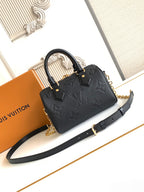Louis Vuitton black embossed handbag with strap and gold-tone hardware