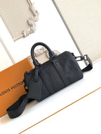 Louis Vuitton monogram tote bag, black with top handles and shoulder strap.