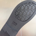 Dior unisex slide sandal outsole in dark gray with embossed logo pattern