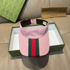 Pink Gucci visor cap with GG monogram and green-red web stripe
