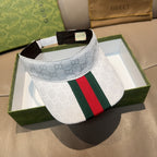 Gucci visor cap with GG monogram, green red web stripe front panel, light blue