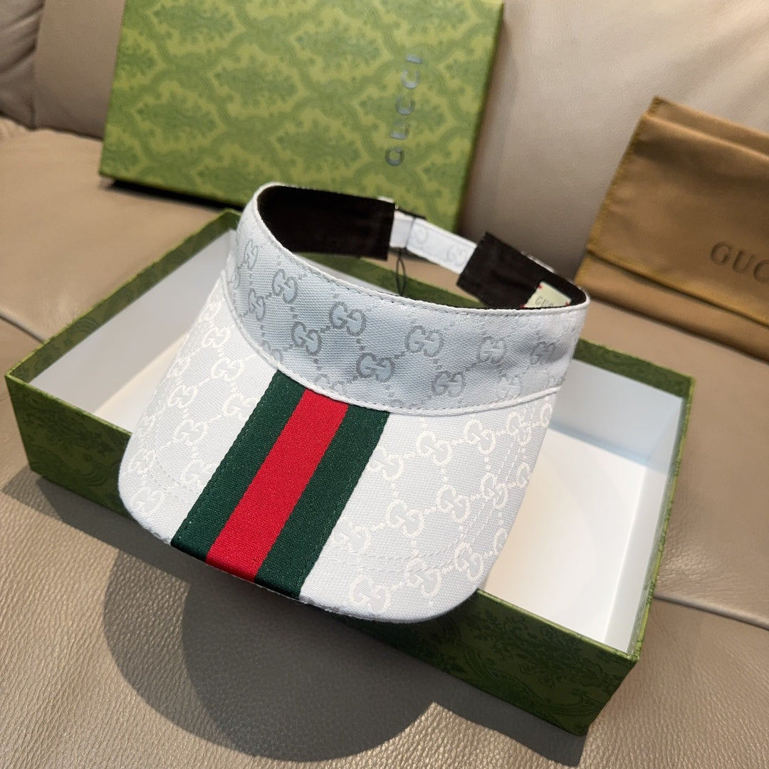 Gucci visor cap with GG monogram and green red web stripe, light blue