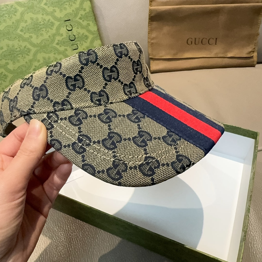 Gucci GG canvas baseball cap with red-blue web stripe and dark underside