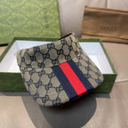 Gucci GG canvas cap with dark brim and red-blue web stripe front