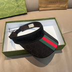 Gucci visor cap in dark GG fabric with green and red stripe panel detail