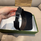 Gucci visor cap close-up of adjustable strap and dark GG fabric back panel