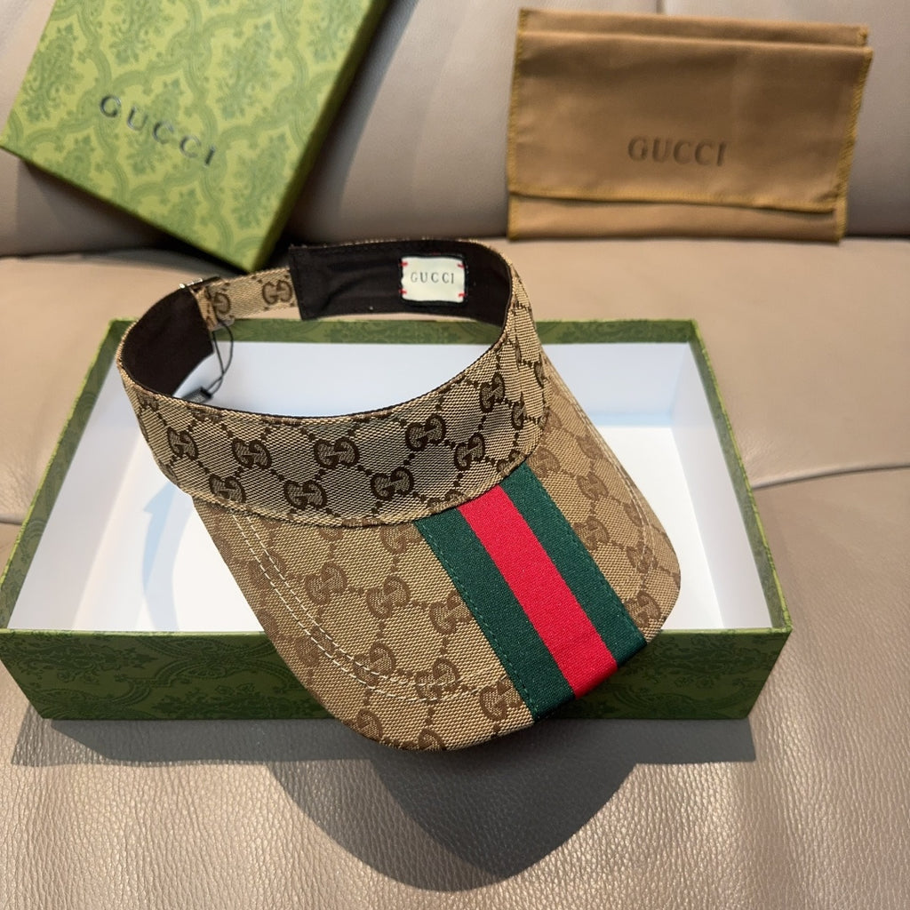 Gucci GG canvas visor cap with green and red web stripe, black interior