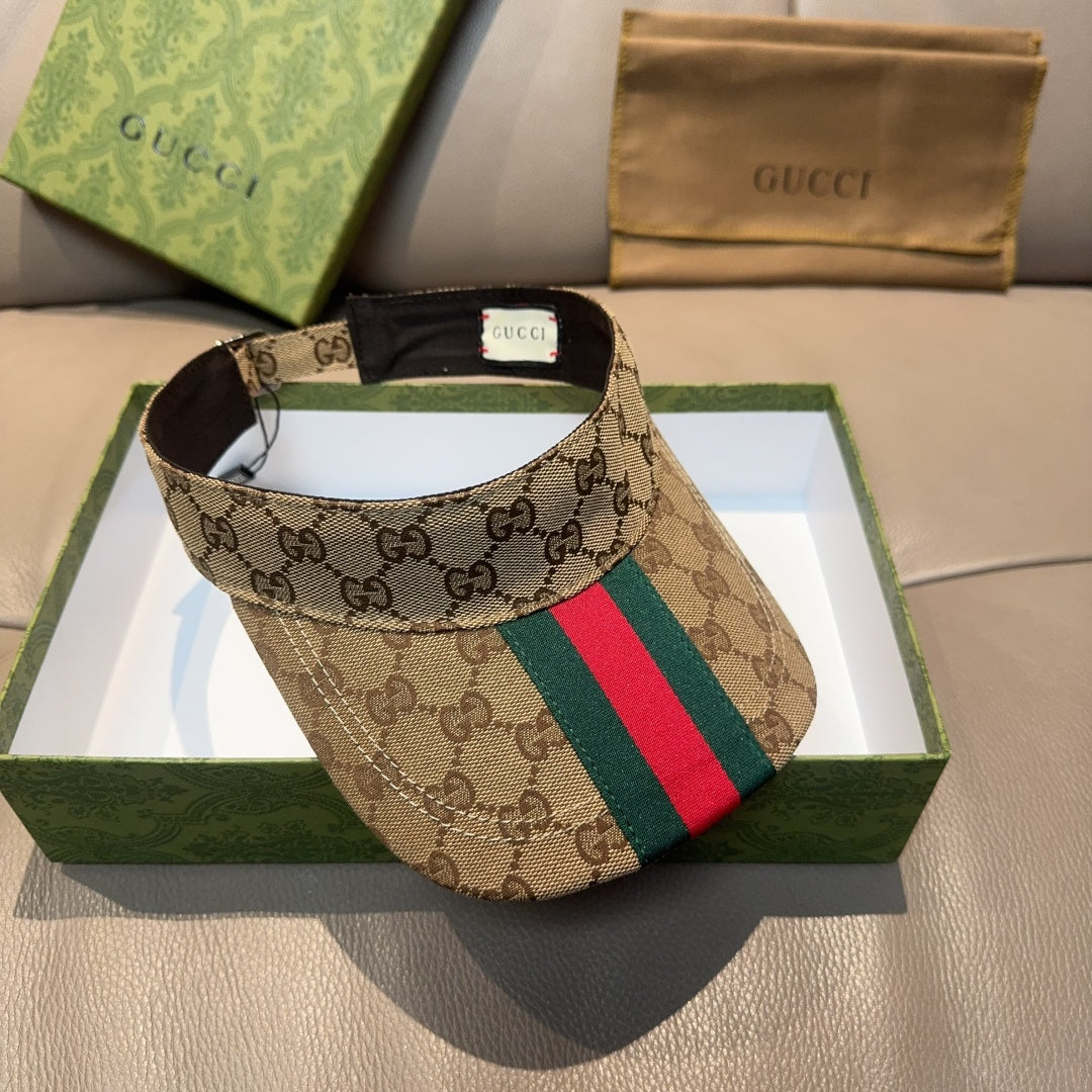 Gucci GG canvas visor cap with green and red web stripe, black interior