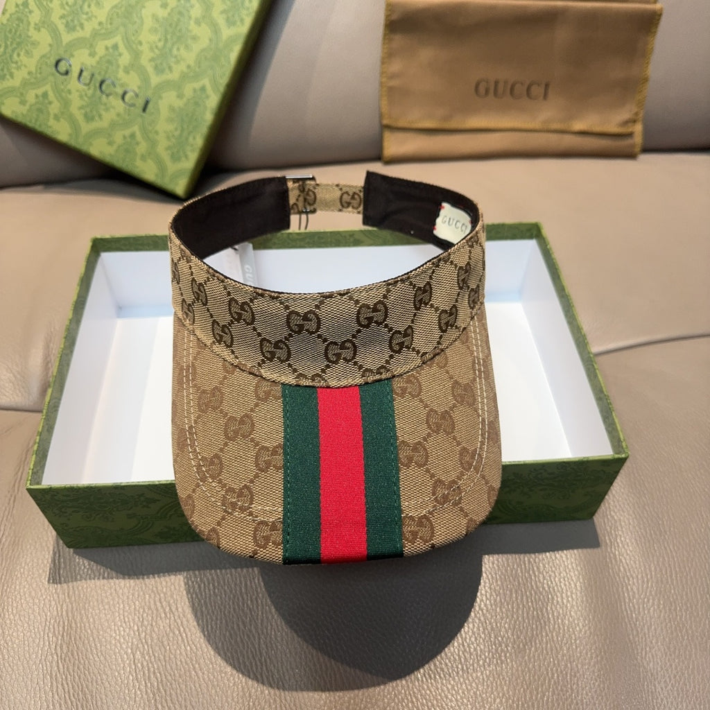 Gucci GG canvas visor cap with green and red web stripe, black brim