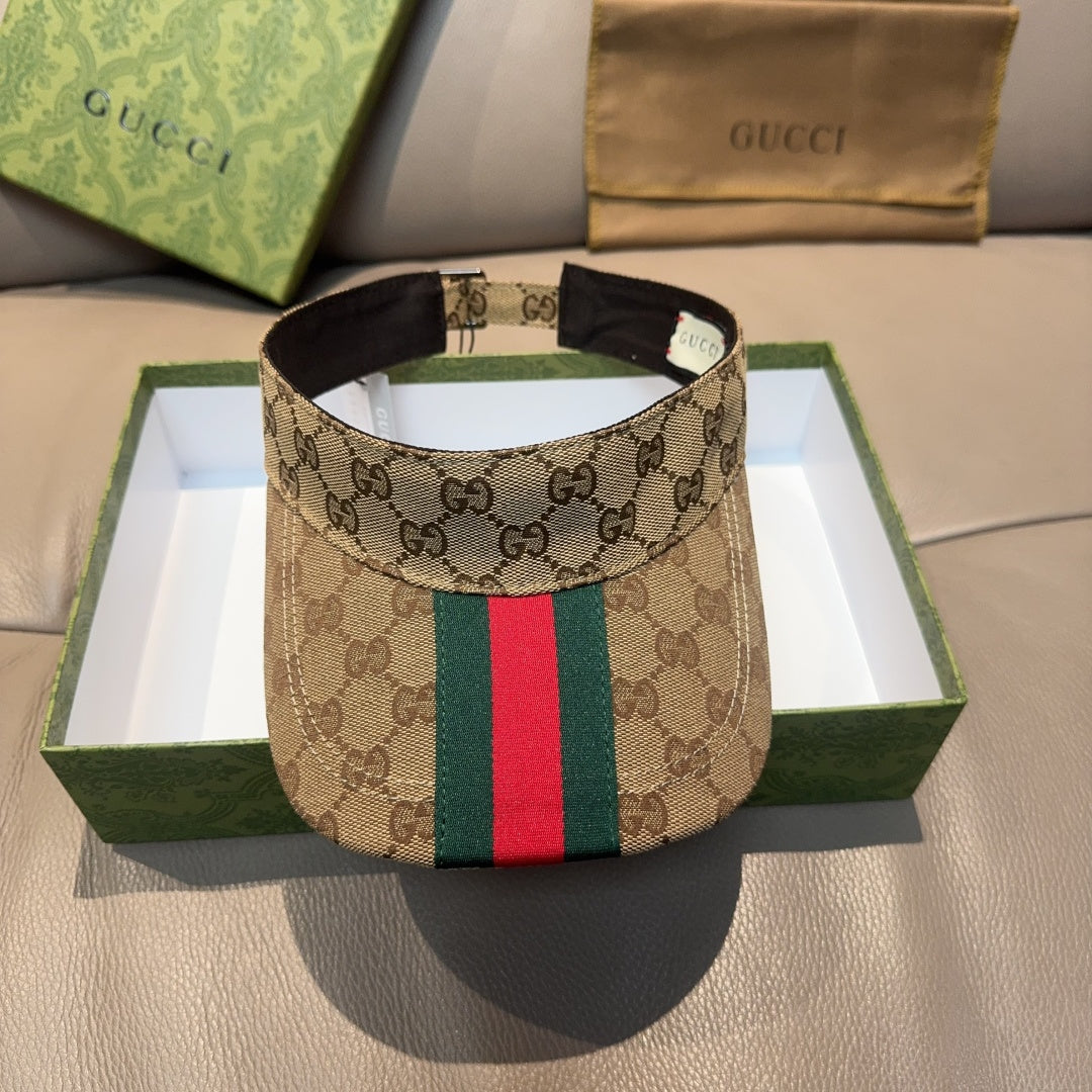 Gucci GG canvas visor cap with green and red web stripe, black brim