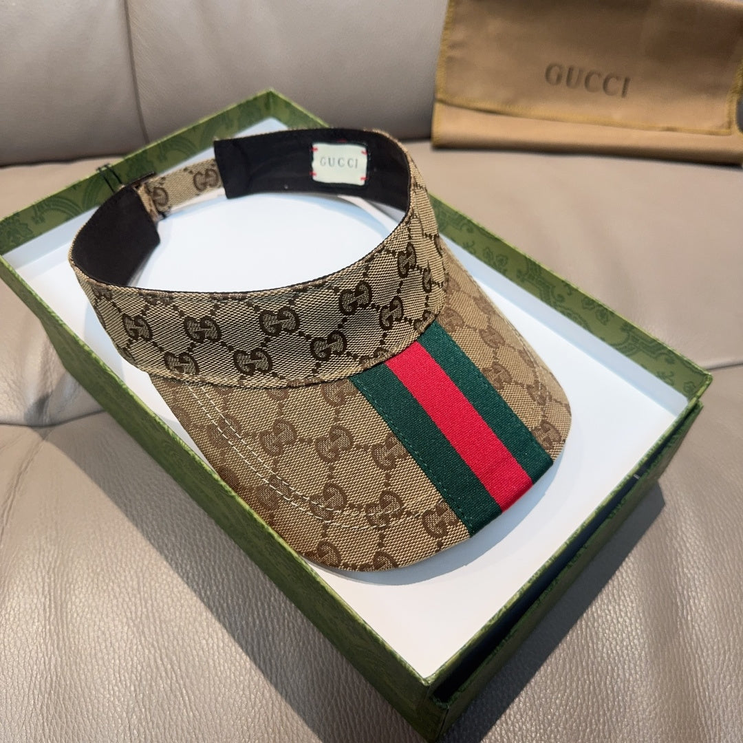 Gucci GG canvas visor cap with green and red web stripe, black underbrim