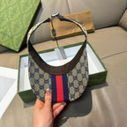 Gucci cap with beige GG canvas, dark brown brim, red-and-navy stripe panel