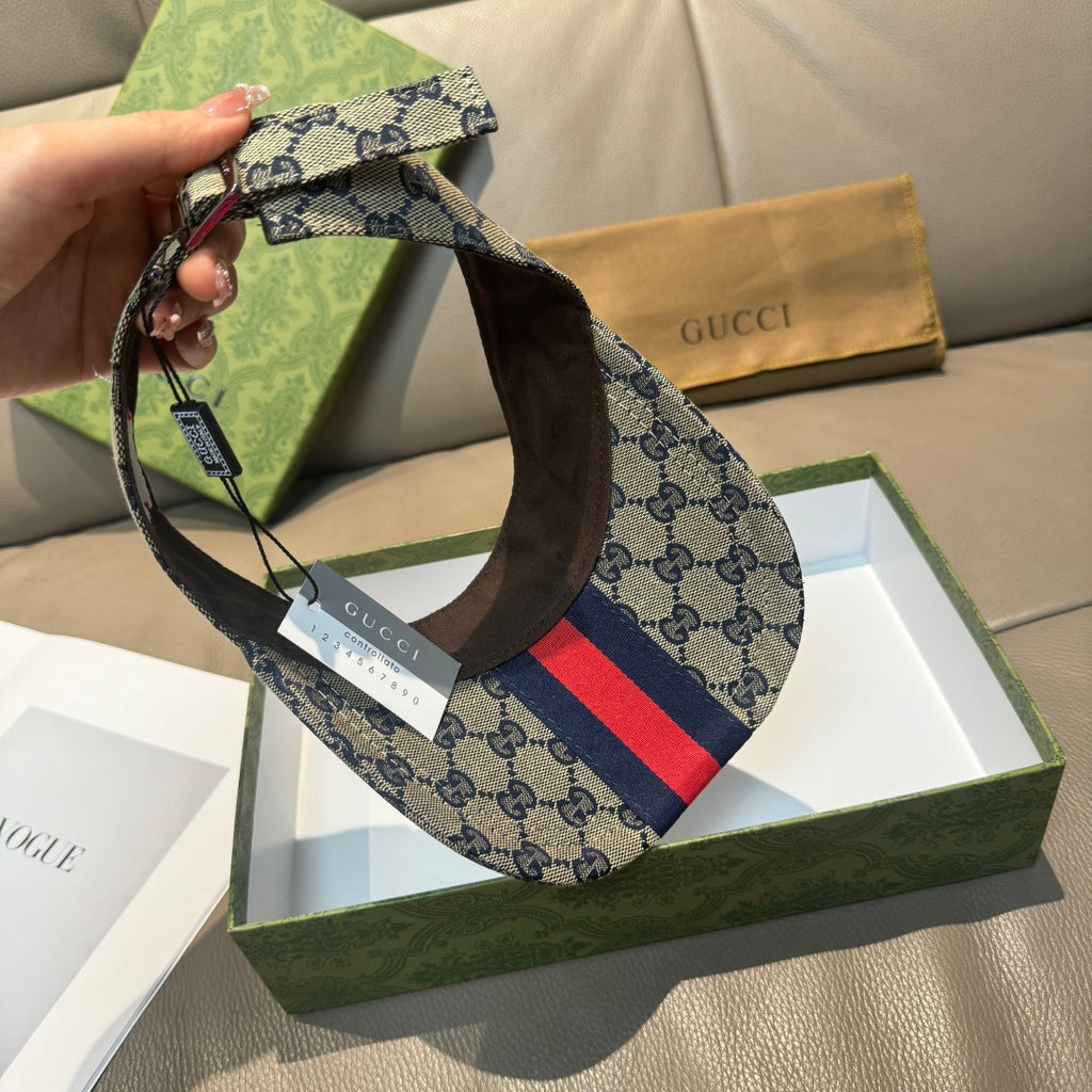 Gucci cap with beige GG canvas strap and red-and-navy stripe, side view