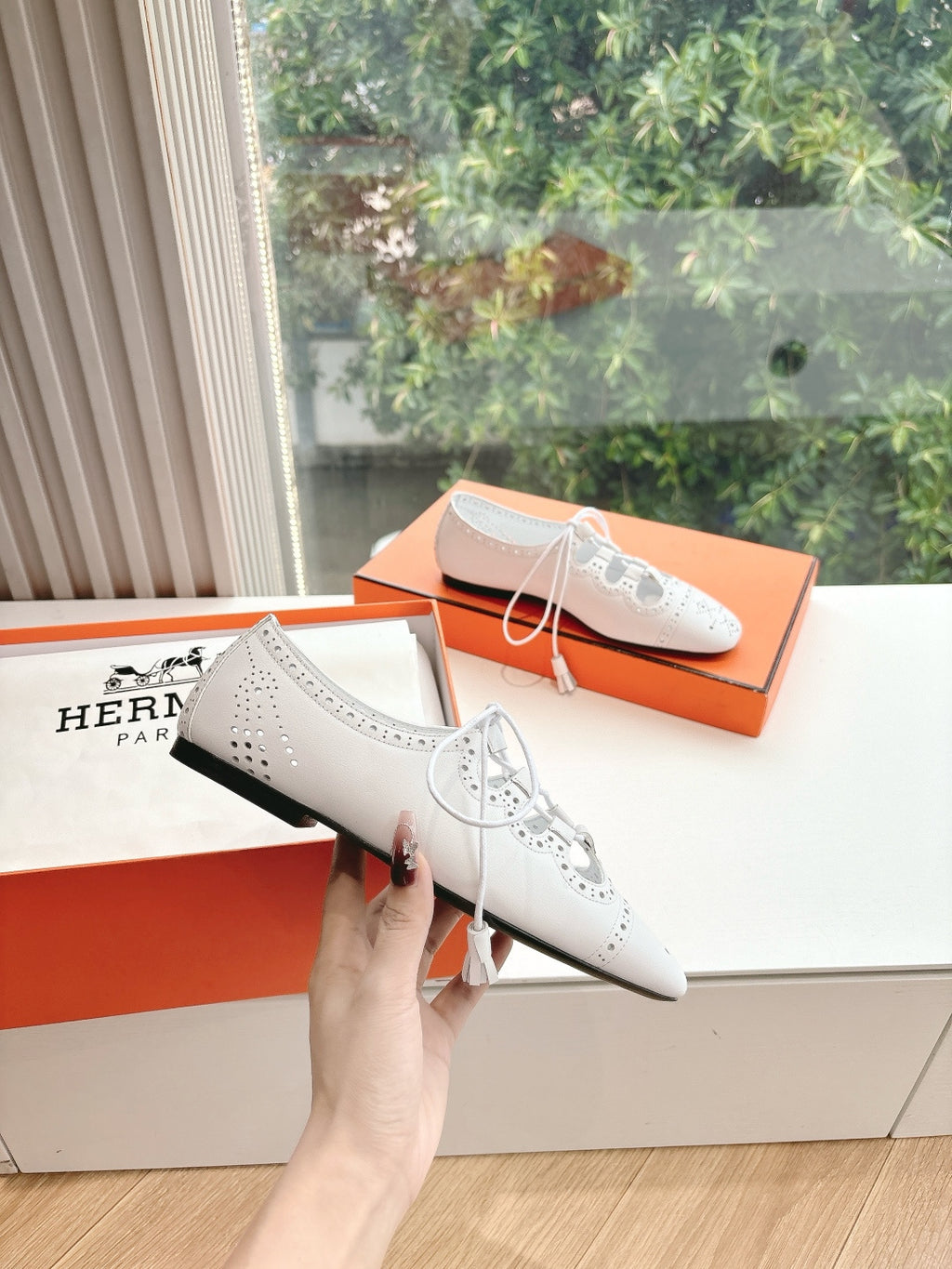 Hermes ladies white leather lace-up shoes with brogue perforations and black sole