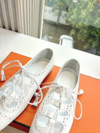 Hermes ladies white lace-up oxford shoes with perforated cutouts and white laces