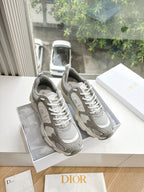 Women’s lace-up sneakers in light gray with white mesh panels and chunky sole