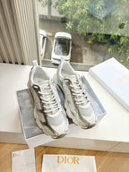 Dior women's sneakers in white with textured panels and lace-up front, side-by-side view