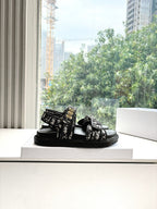 Black Dior sandals with double straps and chunky rubber sole, front view