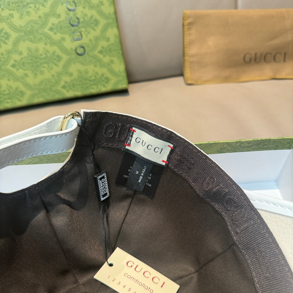 Gucci cap interior with black lining, webbing trim, and size tag