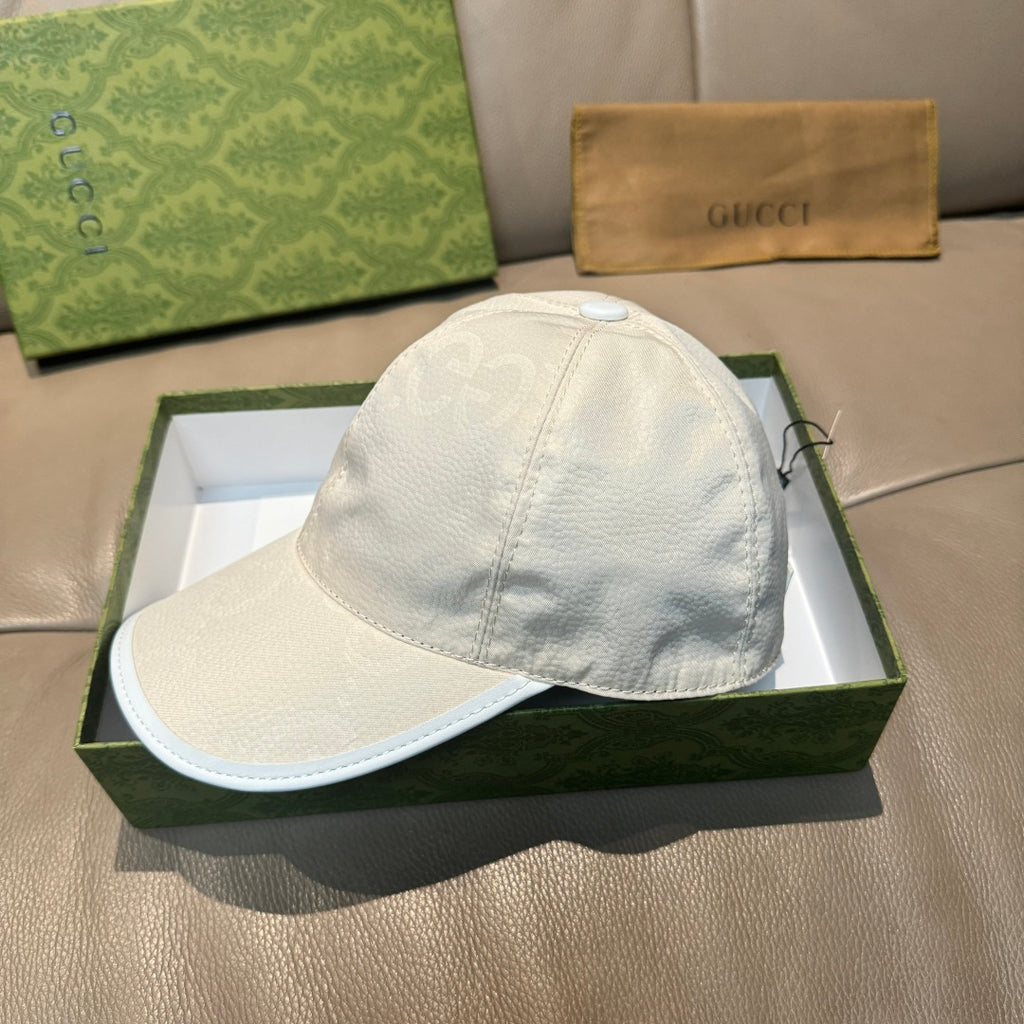White leather baseball cap with curved brim and small top button