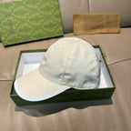 White leather baseball cap with curved brim and small top button
