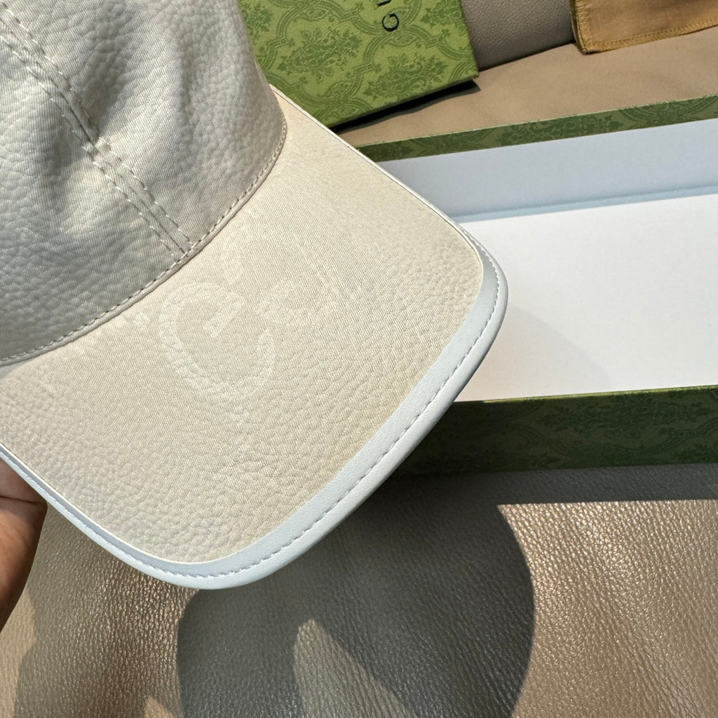 White leather cap brim with light blue edge piping