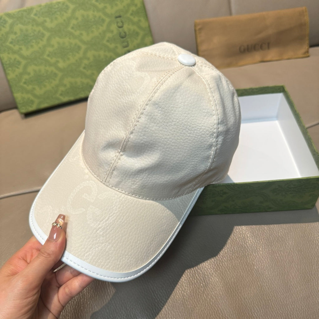 White leather baseball cap with curved brim and top button