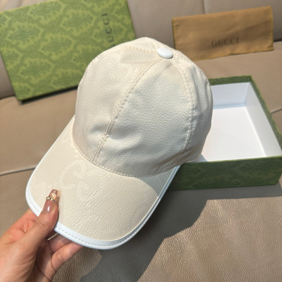 White leather baseball cap with curved brim and top button