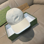 White leather baseball cap with curved brim