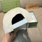 White cap interior with black panel and light blue band, hang tag attached