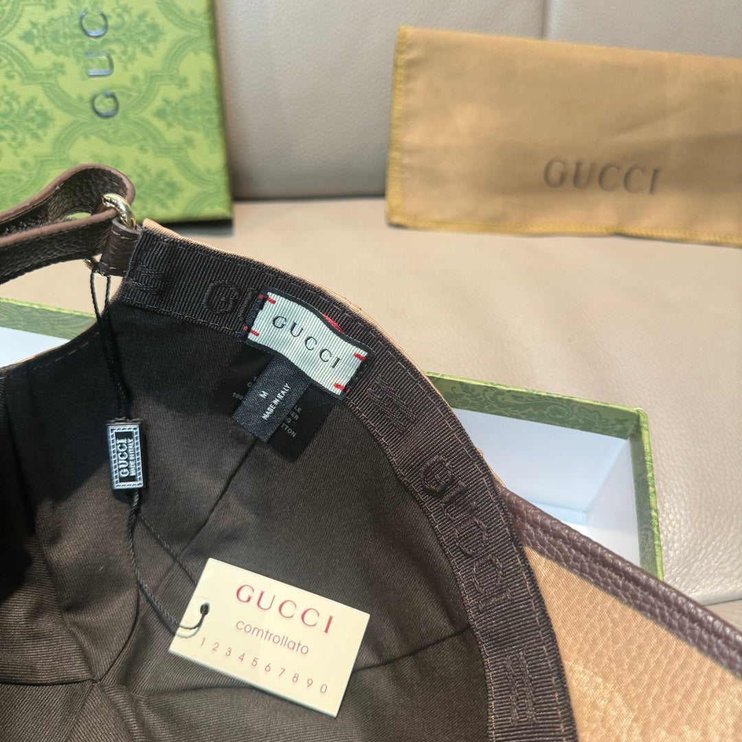 Gucci black cap with logo patch and size/brand tags attached