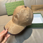 Gucci GG baseball cap in beige-brown with dark button top and textured monogram fabric