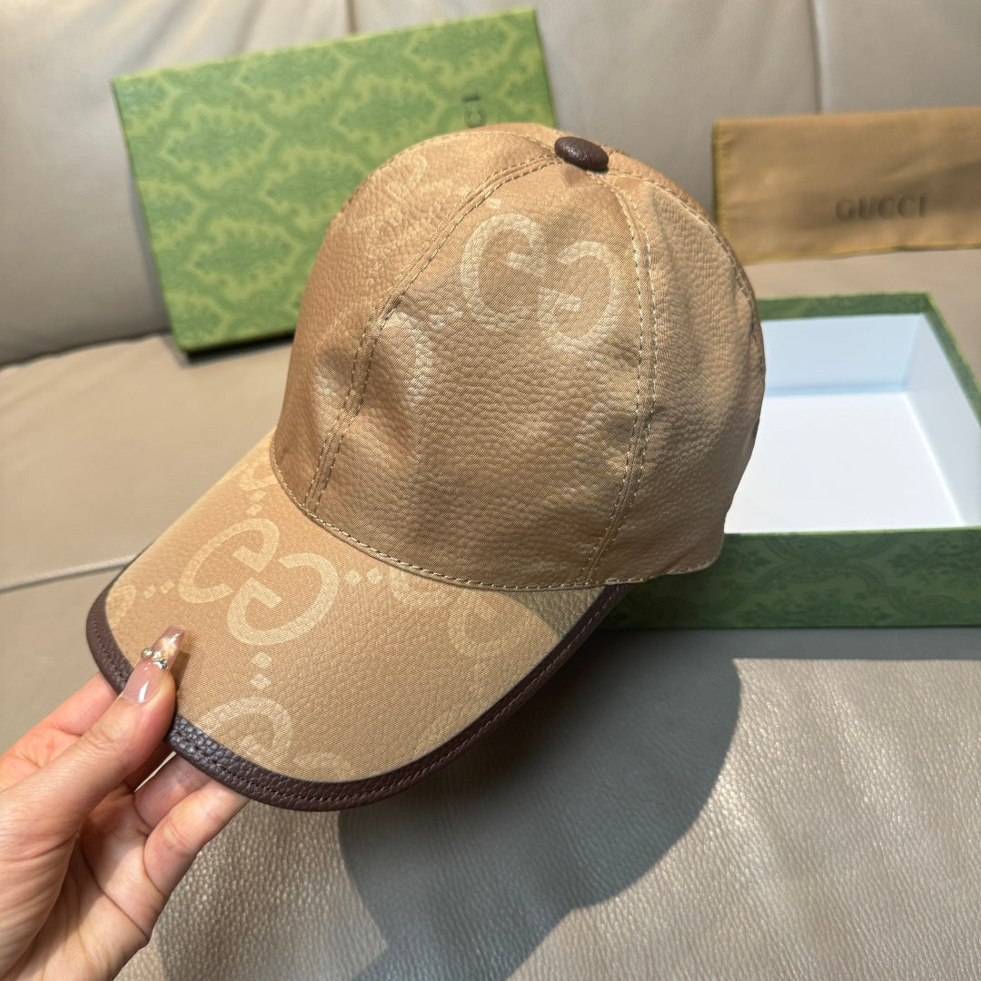 Gucci GG baseball cap in beige-brown with dark button top and textured monogram fabric