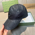 Gucci cap in dark monogram leather-look, crown and curved brim view