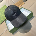 Gucci cap in dark monogram leather-look, curved brim, front seam detail