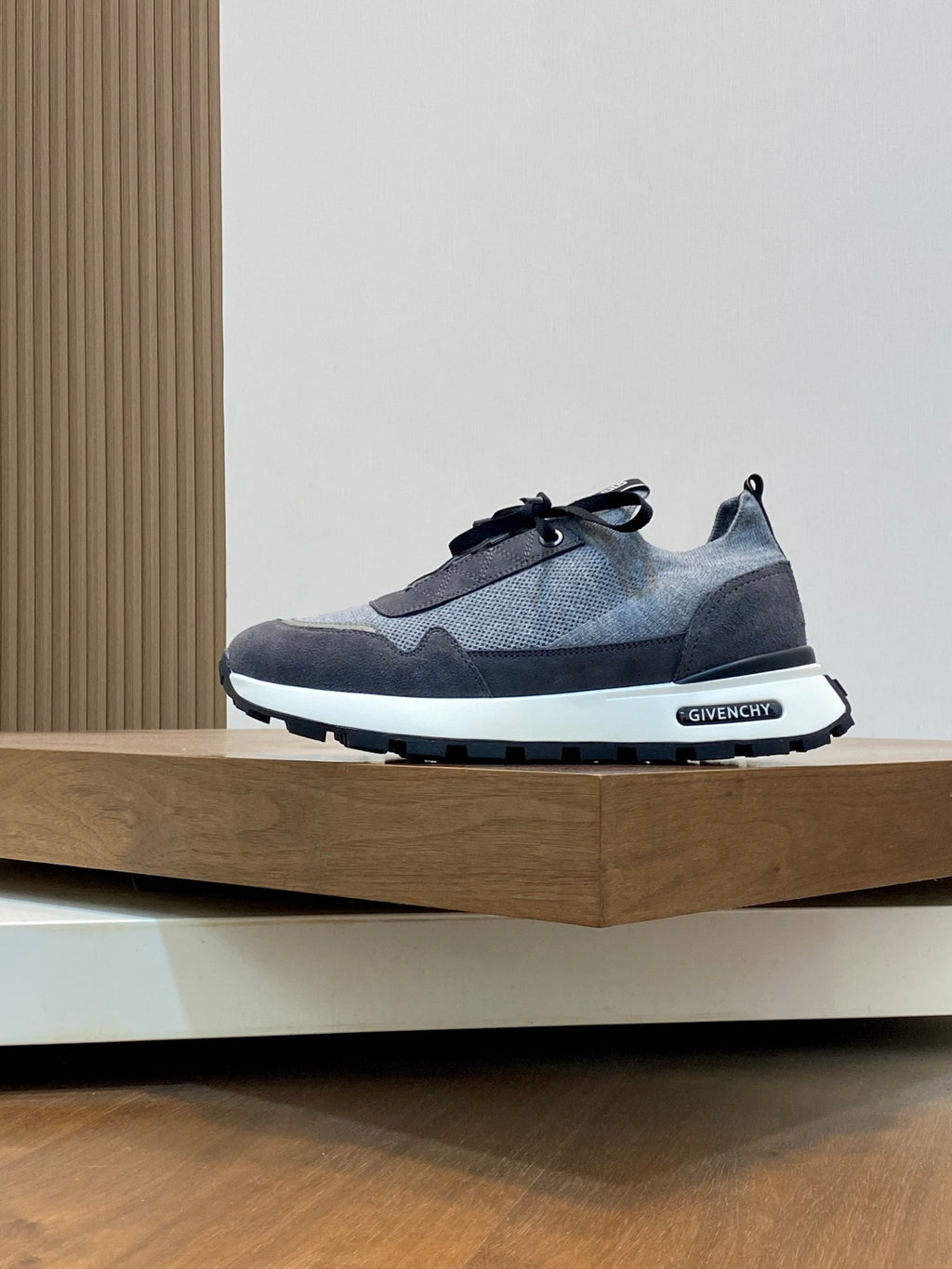 Givenchy gray lace-up sneakers with black eyelets and white midsole