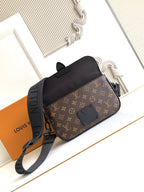 Louis Vuitton monogram crossbody bag with black top flap and adjustable shoulder strap